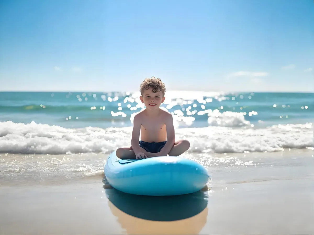 Medusa Glow SUP board — young paddler cruising coastal waters