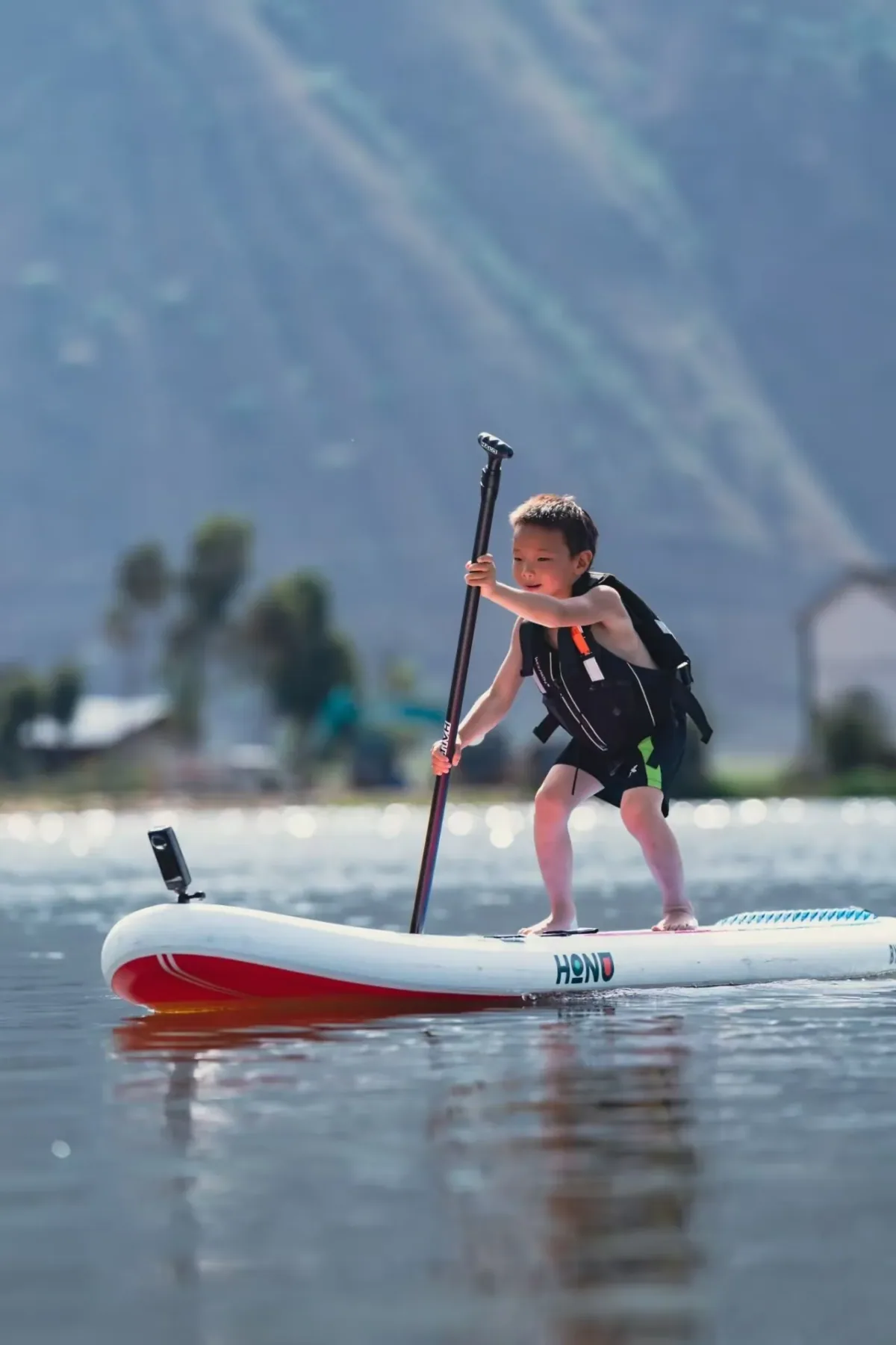 Medusa Glow SUP on calm flatwater at a wellness retreat
